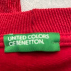 Brand new sweater red with black logo letters.Size L but feels more like M